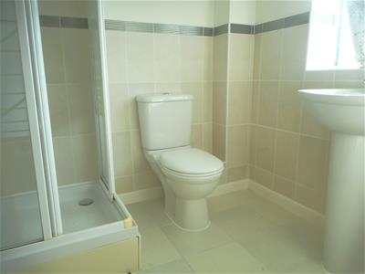 EN-SUITE SHOWER ROOM